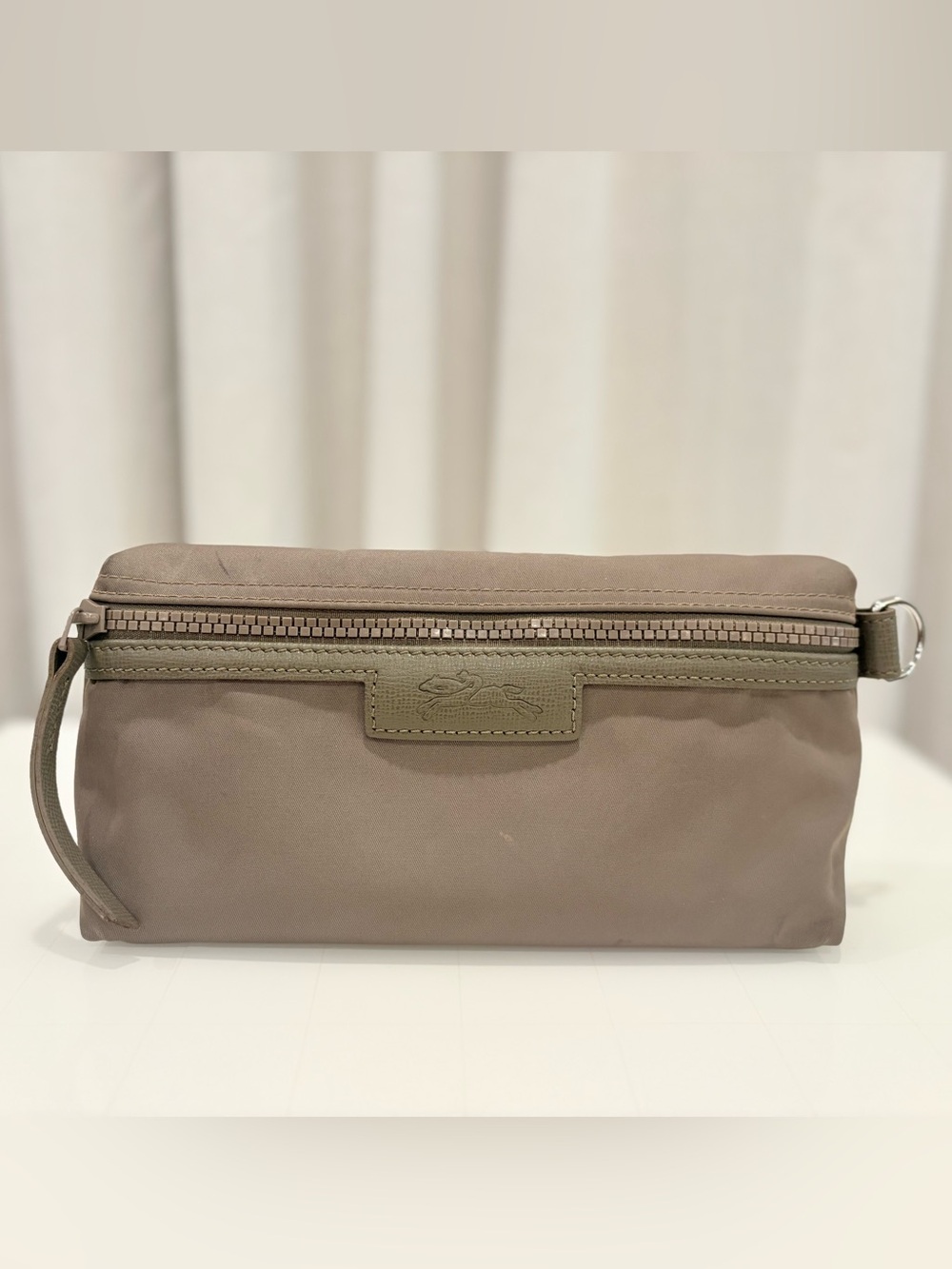 Longchamp taupe travel pouch